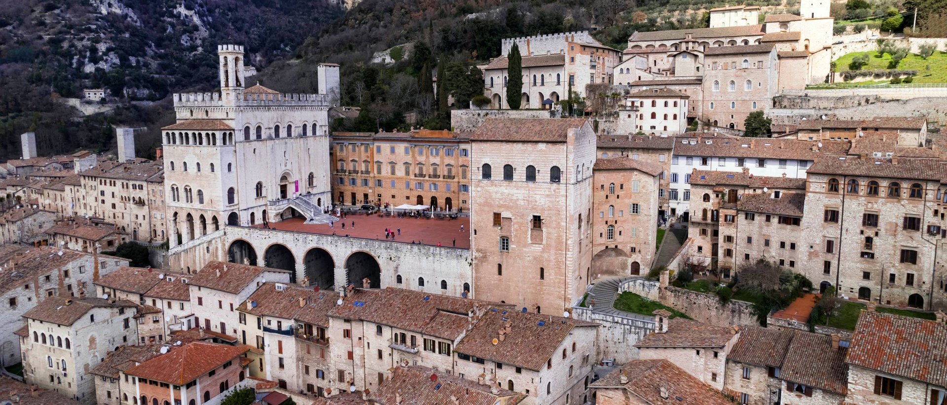 Basilica of Saint Francis of Assisi Aerial view of Gubbio with historic buildings and mountains in background
